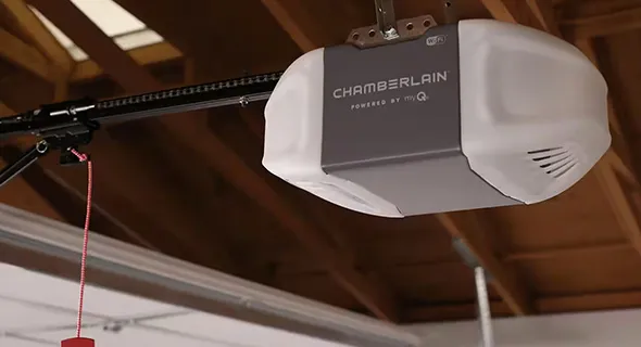A professional technician installing a garage door motor, with text describing repair services in Boerne, TX.