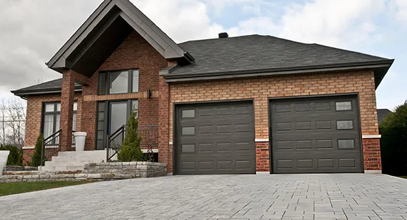 A house with a double garage door in Fair Oaks Ranch, TX, with text about trusted garage door company services.