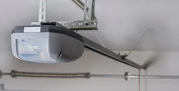 An automatic garage door motor installed on a garage ceiling, highlighting high-performance equipment.